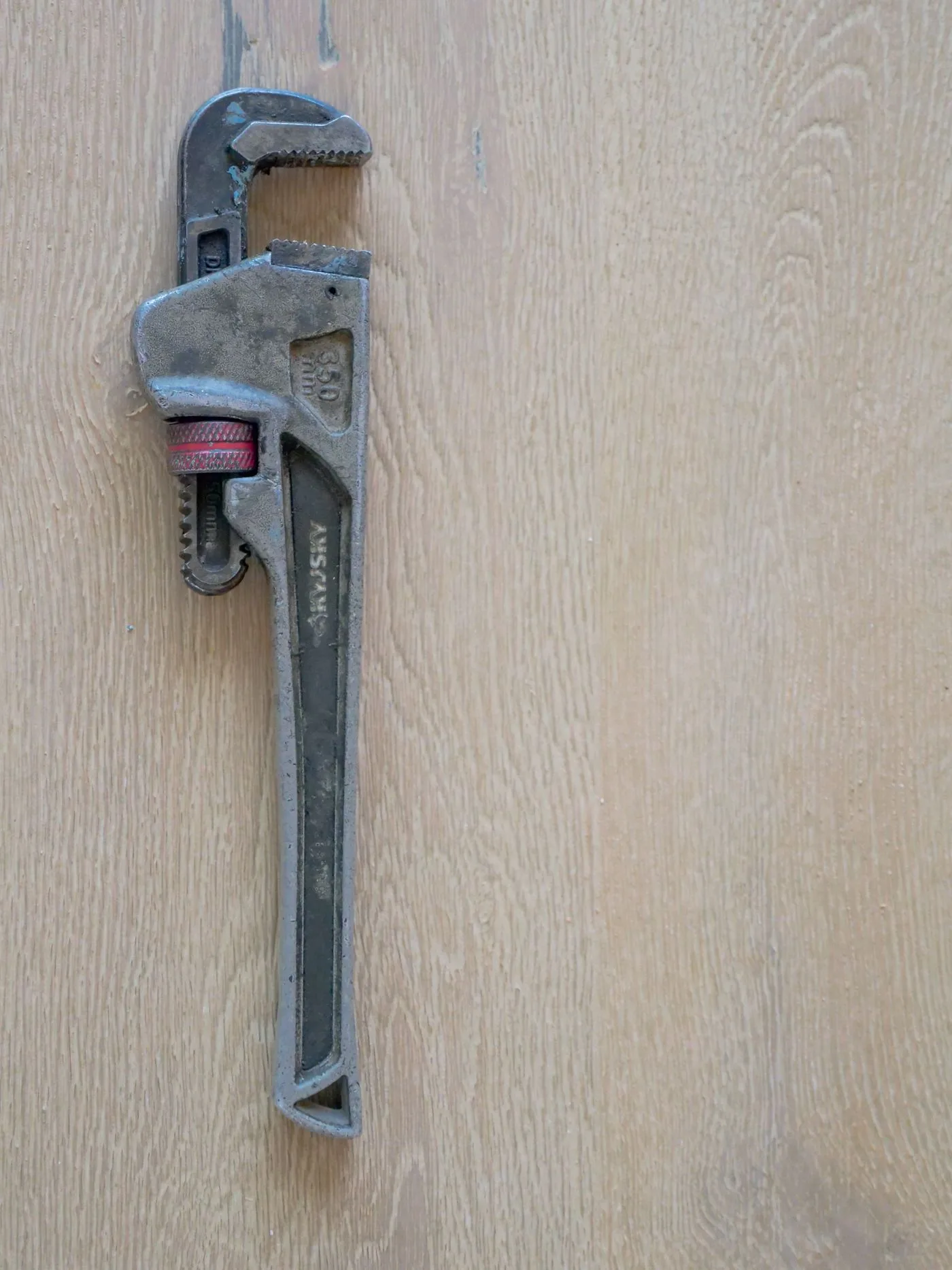 Plumbing tools laid out for a job